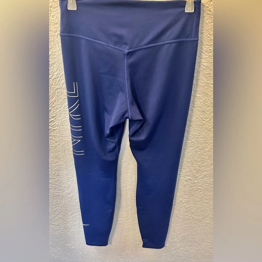 NIKE DRI FIT BLUE WOMEN'S SIDE LOGO‎ METALLIC SILVER RUNNING TIGHTS SZ M